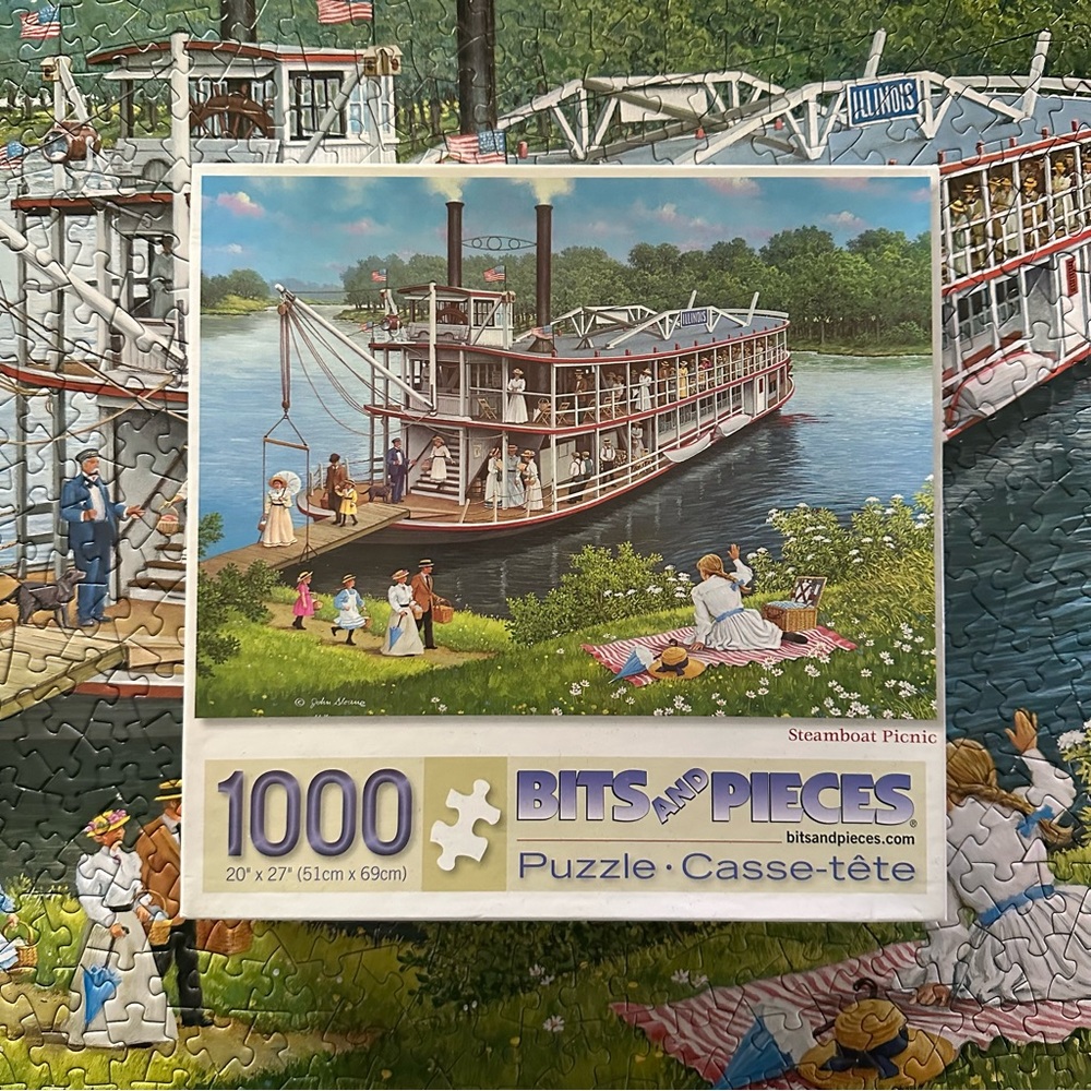 1000 piece Bits and Pieces ‘Steamboat Picnic’ John Salone Jigsaw Puzzle